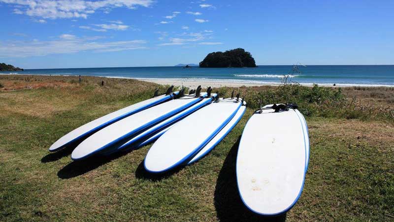 Experience the thrill of riding a wave at one of New Zealand's most iconic beaches with a 2hr surf lesson brought to you by the O'Neill Surf Academy!